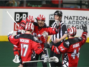Roughnecks Tyler Pace (C) celebrates his first half goal with teammates during National Lacrosse League West Division final action between the Calgary Roughnecks and Colorado Mammoth in Calgary on Friday, May 10, 2019. Jim Wells/Postmedia