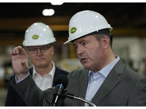 Alberta Premier Jason Kenney (right) and Alberta Associate Minister of Red Tape Reduction Grant Hunter (left) announced at PCL Fabrication Facility in Nisku on Wednesday May 29, 2019 how the government will boost Alberta's competitiveness and bring new business and investment back to the province.