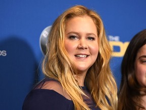 Actress Amy Schumer poses in the press room at the 2018 DGA Awards at the Beverly Hilton, on February 3, 2018, in Beverly Hills, California.