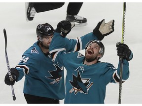 San Jose Sharks right wing Joonas Donskoi, right, celebrates with defenseman Marc-Edouard Vlasic (44) after scoring a goal against the Colorado Avalanche during the second period of Game 7 of an NHL hockey second-round playoff series in San Jose, Calif., Wednesday, May 8, 2019.