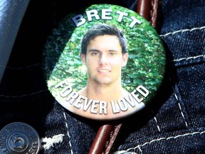 A button commemorates Brett Wiese, who was stabbed to death at a Calgary house party in Jan. 12, 2013.