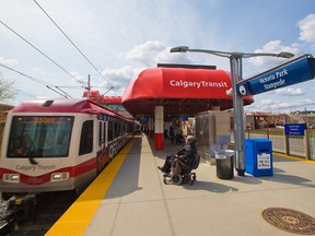 Commuters move through the Stampede/Victoria Park CTrain station on Thursday May 9, 2019.