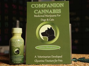 In this photo taken Thursday, May 30, 2013, Companion Cannabis, by Holistic Therapeutics, a Marijuana medicinal tincture for dogs and cats is seen at La Brea Compassionate Caregivers, a medical marijuana dispensary in Los Angeles Thursday, May 30, 2013.