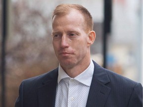 A file photo shows Travis Vader arriving in court in Edmonton on March 8, 2016. He was convicted o manslaughter in the deaths of Lyle and Marie McCann.