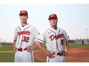 Okotoks Dawgs' Brendan Logan (L), a right handed pitcher from UBC and cousin Gavin  (R), a catcher, pose in Okotoks, south of Calgary on Wednesday, May 29, 2019. Jim Wells/Postmedia
