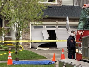 Emergency crews at the scene of a potential explosion on Kincora Drive N.W. on Saturday, May 25, 2019, which left two dead and another with critical injuries.