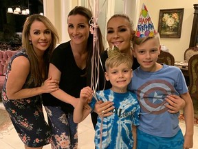 Natalya (centre) with her sisters Jenni and Muffy, along with her newphes Lachlan and Maddox, who are celebrating family birthdays.