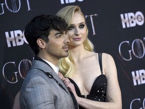 In this April 3, 2019 file photo, Joe Jonas, left, and Sophie Turner attend HBO's "Game of Thrones" final season premiere at Radio City Music Hall in New York. The couple have gotten married in a surprise ceremony in Las Vegas. It happened Wednesday night, May 1 after the Billboard Music Awards, where the Jonas Brothers had performed. Turner's publicist confirmed the nuptials, which DJ Diplo posted on his Instagram live feed.