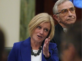 Alberta NDP Leader Rachel Notley speaks beside Bob Wanner (Speaker of the Legislative Assembly of Alberta) after being sworn in at the Alberta Legislature on Monday May 13, 2019.