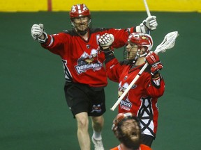 Calgary Roughnecks Riley Loewen celebrates a goal against Buffalo Bandits goalie, Matt Vinc in Game 2 of the 2019 NLL  Finals at the Scotiabank Saddledome  Calgary on Saturday, May 25, 2019. Darren Makowichuk/Postmedia