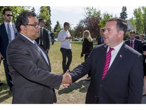 Mayor Naheed Nenshi and then-MP Jason Kenney shake hands after an event in Calgary in this photo from 2015.