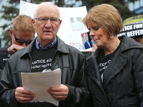 Parents Irene and Pat Heffernan and family give an emotional speech of son Anthony Heffernan who was shot by police as 100 supporters came out for the justice walk and rally in Calgary, Alta. on Saturday April 4 2015.