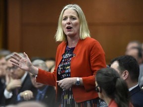 Minister of Environment and Climate Change Catherine McKenna rises during Question Period in the House of Commons on Parliament Hill in Ottawa on Thursday, May 16, 2019.