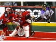 Calgary Roughnecks goalie, Christian Del Bianco makes a save on San Diego Seals, Austin Staats in National Lacrosse Leagure action at the Scotiabank Saddledome in Calgary on Saturday, March 30, 2019. Darren Makowichuk/Postmedia