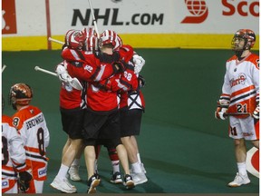 The Calgary Roughnecks celebrate a goal on Buffalo Bandits goalie Matt Vinc in Game 2 of the 2019 NLL  Finals at the Scotiabank Saddledome  Calgary on Saturday. Photo by Darren Makowichuk/Postmedia.