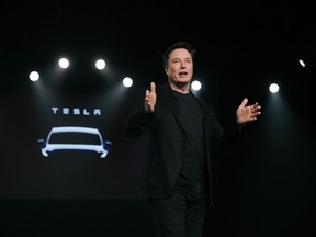 In this March 14, 2019, file photo Tesla CEO Elon Musk speaks before unveiling the Model Y at Tesla's design studio in Hawthorne, Calif.