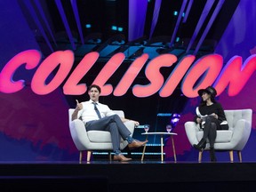 Prime Minister Justin Trudeau participates in an armchair discussion with founder and CEO of BroadbandTV Corp, Shahrfad Rafaiti, at the Collision tech conference in Toronto on Monday May 20, 2019.