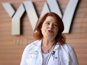 YWCA Vice President Recourse Development Jan Damery talks to the media as the new YCWA in Inglewood opens for a sneak peak by the members of the community on Neighbour Day in Calgary on Saturday, June 15, 2019. Azin Ghaffari/Postmedia Calgary