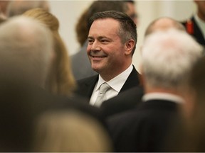 Premier Jason Kenney is framed by MLA's and guests during as the Speech from the Throne opens the first session of the 30th Alberta Legislature, in Edmonton Wednesday May 22, 2019. Photo by David Bloom ORG XMIT: POS1905221718046359