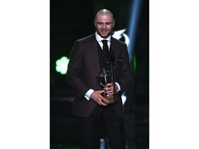 LAS VEGAS, NEVADA - JUNE 19: Mark Giordano of the Calgary Flames accepts the James Norris Memorial Trophy awarded to the defense player who demonstrates throughout the season the greatest all-around ability in the position during the 2019 NHL Awards at the Mandalay Bay Events Center on June 19, 2019 in Las Vegas, Nevada.