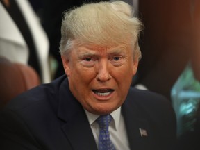 U.S. President Donald Trump speaks to reporters about Iran and Mexico after signing an executive order establishing a White House Council on eliminating regulatory barriers to affordable housing, in the Oval Office at the White House on June 25, 2019 in Washington, DC. The council, which will be made up of members of eight federal agencies, will reportedly be tasked with easing local barriers to the private sector of creating housing, according to published reports. (Photo by Mark Wilson/Getty Images)
