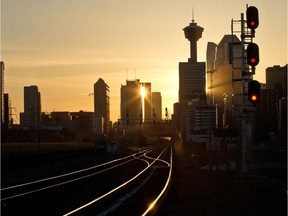 The sunset lights up the CP Rail tracks stretching into downtown Calgary at dusk on Tuesday April 2, 2019. Gavin Young/Postmedia