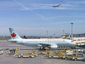 In this file photo taken on May 1, 2018 an Air Canada plane sits on the tarmac at Trudeau airport near Montreal, Canada. - A woman boarded an Air Canada flight earlier in June 2019, fell asleep after takeoff and woke up alone in a dark, parked plane, apparently forgotten about by ground staff. Tiffani Adams's story was posted by a friend on Air Canada's Facebook page, drawing incredulous reactions from readers and a request for details from the airline.According to the post, Adams was flying from Quebec to Toronto Pearson International Airport when she fell asleep, aided by the fact that she'd ended up with a whole row of seats to herself.