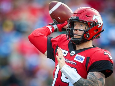 Calgary Stampeders quarterback Bo Levi Mitchell throws the ball against the Ottawa Redblacks during CFL football in Calgary on Saturday, June 15, 2019. Al Charest/Postmedia