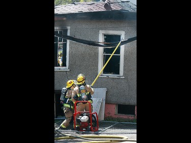 Calgary Fire crews were on scene at a fire in an abandoned home at 2500 16 Street SW in Bankview Friday, June 28, 2019. Dean Pilling/Postmedia