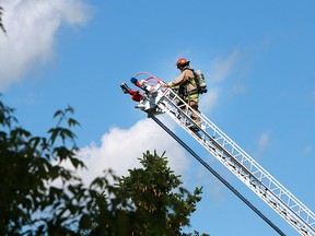 Calgary Fire crews were on scene at a fire in an abandoned home at 2500 16 Street SW in Bankview Friday, June 28, 2019. Dean Pilling/Postmedia