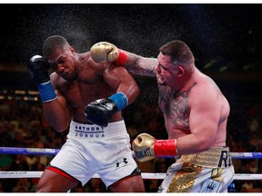 Boxing - Anthony Joshua v Andy Ruiz Jr - WBA Super, IBF, WBO & IBO World Heavyweight Titles - Madison Square Garden, New York, United States - June 1, 2019   Andy Ruiz Jr in action with Anthony Joshua  Action Images via Reuters/Andrew Couldridge       TPX IMAGES OF THE DAY ORG XMIT: AI