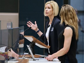 Small business owners Kelly Doody, left and Kristi Stuart plead for tax relief with City Council following a rally outside City Hall protesting huge hikes in business taxes on June 10. File photo by Gavin Young/Postmedia.