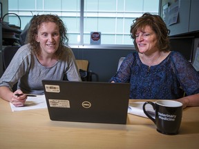 Postdoctoral researcher Niamh Caffrey, left and Dr. Sylvia Checkley with the University of Calgary’s Faculty of Veterinary Medicine talk about a new study looking into dog bite statistics in Calgary from 2012-2017. Study results were released on Wednesday, June 19, 2019.  Gavin Young/Postmedia