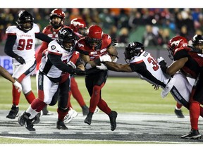The Calgary Stampeders' Don Jackson (25) runs the ball against the Ottawa Redblacks during second half Grey Cup action at Commonwealth Stadium, in Edmonton Sunday November 25, 2018. Calgary won 27 to 16.  Photo by David Bloom