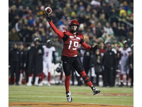 The Calgary Stampeders' quarterback Bo Levi Mitchell (19) throws for Calgary's second touchdown against the Ottawa Redblacks during first half Grey Cup action at Commonwealth Stadium, in Edmonton Sunday November 25, 2018. Photo by David Bloom
