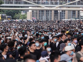 Protesters rally against a proposed extradition bill in Hong Kong, China June 12, 2019. REUTERS/Tyrone Siu ORG XMIT: DTY307