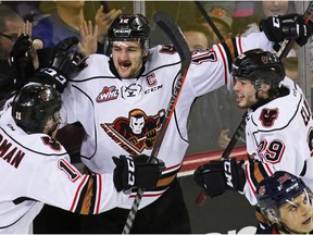 The Calgary Hitmen's Mark Kastelic celebrates after scoring on Lethbridge Hurricanes goaltender Carl Tetachuk late in the third to move the Hitmen ahead of the Hurricanes in their WHL playoff game in Calgary on Sunday, March 31, 2019. The Hurricanes went on to score in OT to stretch the series to a seventh game. Gavin Young/Postmedia