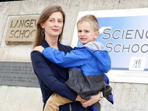Bridgeland Resident Kelsey Meyer is concerned her four-year-old son Conrad won't get into Langevin School, located across the street from their home, after the CBE secretly changed the rules around the lottery process. Friday, June 14, 2019. Brendan Miller/Postmedia