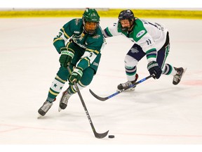 Calgary Northstars Kieran Ruscheinski carries the puck up the ice against Jacob Wright of the Fraser Valley Thunderbirds during the Mac's AAA hockey tournament at Max Bell Centre on Wednesday, December 26, 2018. Al Charest/Postmedia