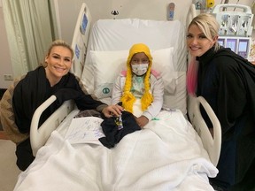 Myself (left) and Alexa Bliss (right) with Jude at the children’s hospital in Saudi Arabia.