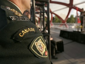 A shoulder flash showing the 41 Brigade Group is shown during the Breakfast on the Bridge fundraising event held on the Peace Bridge at sunrise in Calgary, Alta on Saturday June 20, 2015. Jim Wells/Postmedia Calgary