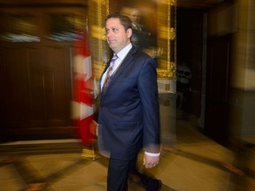 Conservative Leader Andrew Scheer makes his way to a media availability in the foyer of the House of Commons on Parliament Hill, in Ottawa on Monday, June 10, 2019.