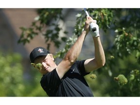 Andrew Harrison, of Camrose Alta., tees off on the 10th hole during third round play at the 111th Canadian Men's Amateur Golf Championship at the Weston Golf and Country Club on Wednesday August 12, 2015. Jack Boland/Toronto Sun/Postmedia Network
