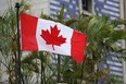The Canadian flag flies outside the Canadian Embassy in Caracas on June 3, 2019. - Canada announced Sunday it was temporarily shutting its embassy in Venezuela, blaming President Nicolas Maduro for refusing to accredit diplomats critical of his regime.