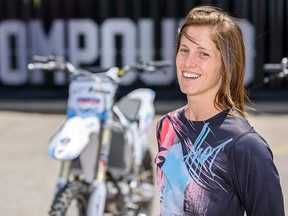 Kassie Boone, motocross rider with the Monster Energy motocross show, poses for a photo at Thrill Zone on Stampede Grounds on Thursday, July 11, 2019. Azin Ghaffari/Postmedia Calgary