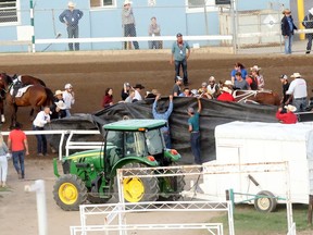 Scene of a crash which killed one horse during the seventh heat of the Rangeland Derby at the Calgary Stampede on Thursday, July 11, 2019.