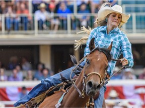 Callahan Crossley from Hermington, Ore., competes in Barrel Racing at the Calgary Stampede Rodeo Wild Card Saturday. Photo by Azin Ghaffari/Postmedia.