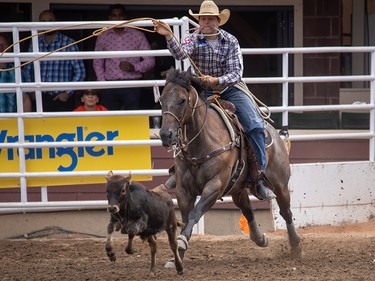 Caleb Smidt from Bellville, Tx., took first place in Tie-Down Roping at the Calgary Stampede in Calgary, Ab., on Sunday July 14, 2019. Mike Drew/Postmedia