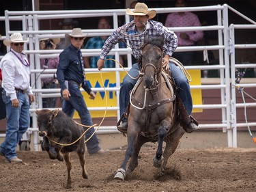 Caleb Smidt from Bellville, Tx., took first place in Tie-Down Roping at the Calgary Stampede in Calgary, Ab., on Sunday July 14, 2019. Mike Drew/Postmedia