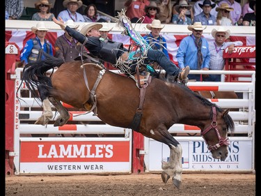 Tyler Aus from Granite Falls, Mn., won Bareback on Yipee Kibitz at the Calgary Stampede in Calgary, Ab., on Sunday July 14, 2019. Mike Drew/Postmedia